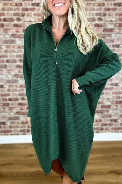 Women's solid colour loose fit knitted dress with raglan sleeves and a front zipper.