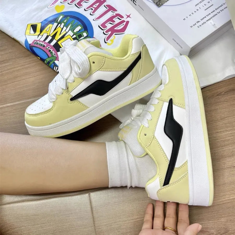 Women's low top board shoes in solid pink, white yellow, white black, or white red with mid heel and rubber sole