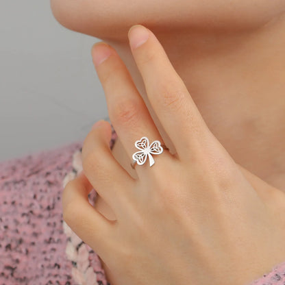 Stainless steel lucky ring with hollow band in gold or steel colour finish.