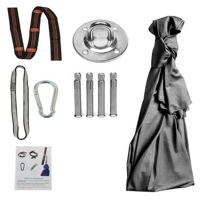 Child in black therapy swing cocoon with multi-loop daisy chain height adjustment system