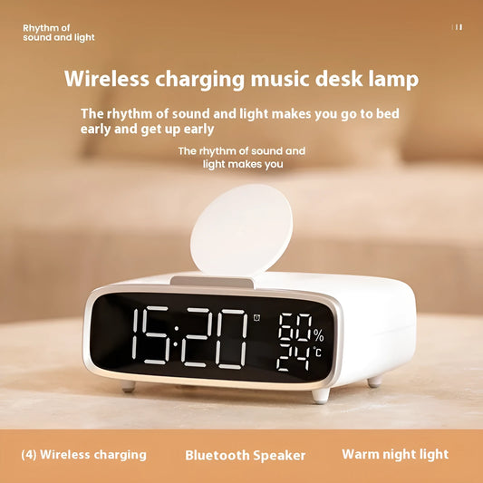 White Bluetooth speaker wireless charger with night lamp functions on wooden surface