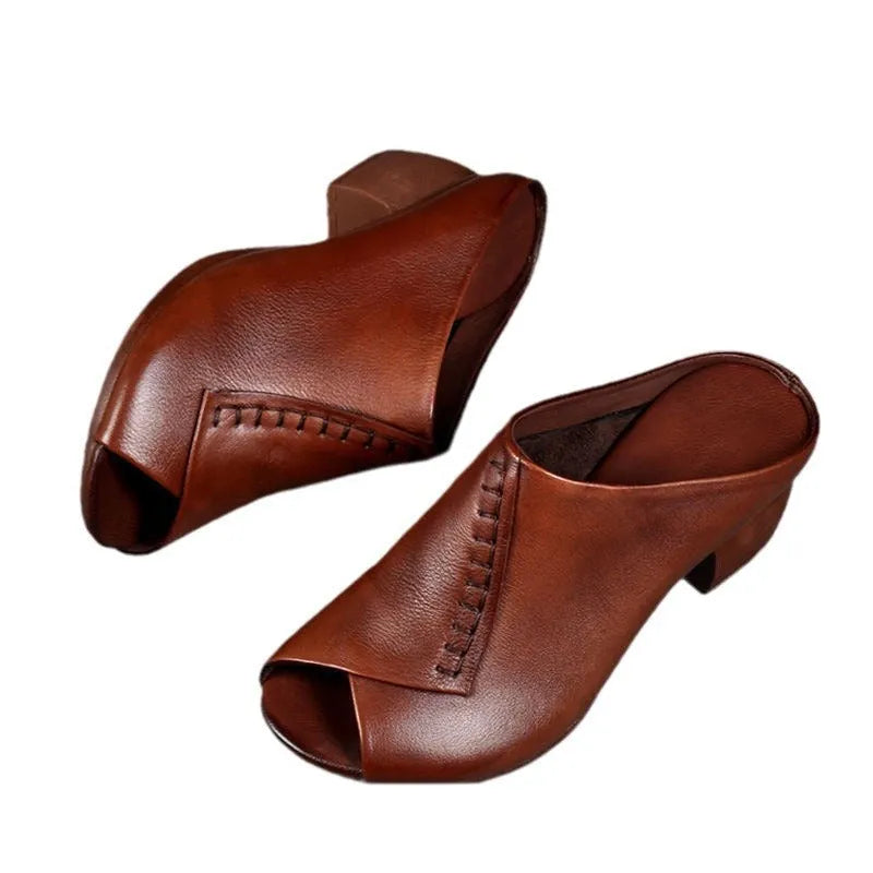Women's black square heel peep toe slippers with a fish mouth scaffold design and rubber sole.
