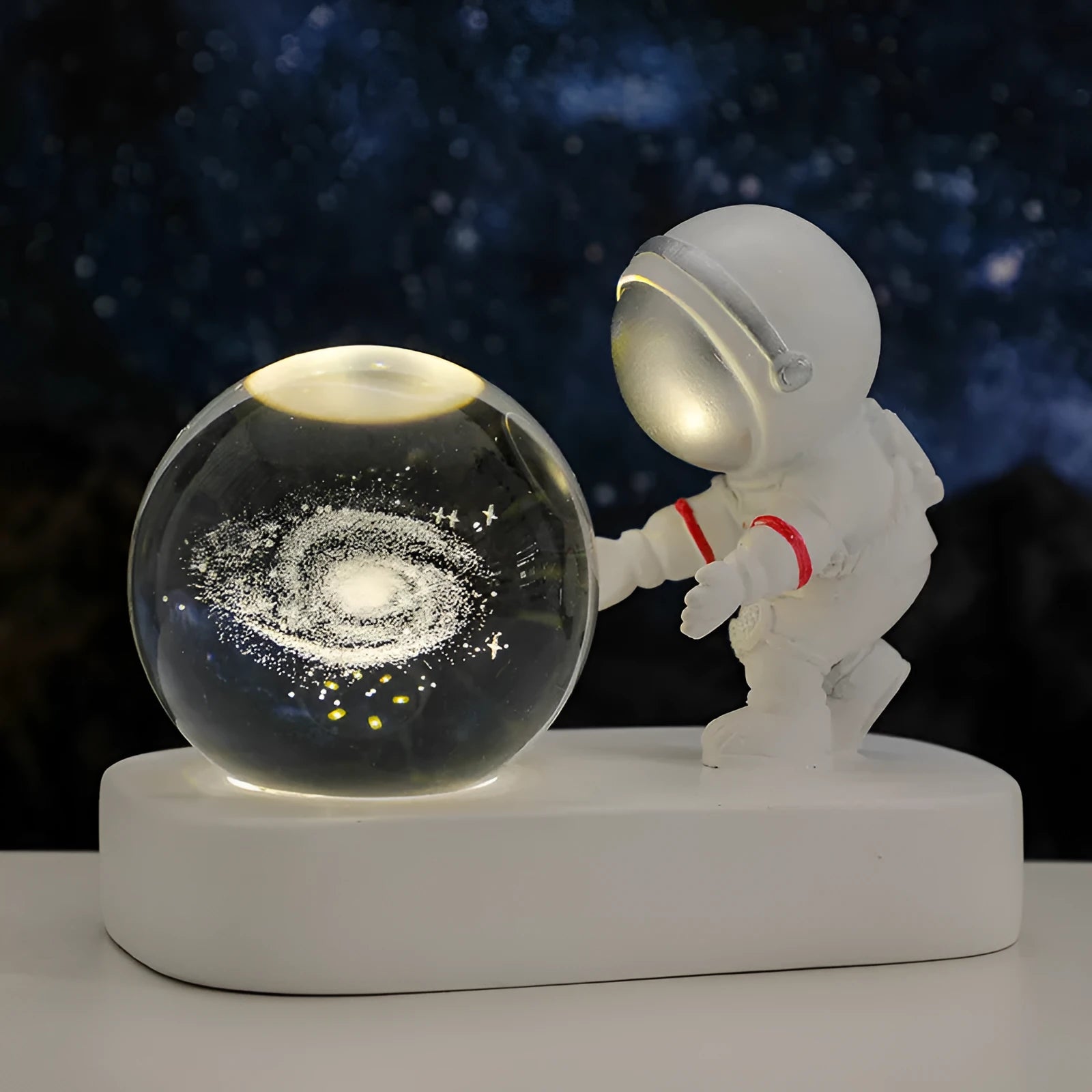 Astronaut crystal ball night light projecting galaxy pattern on 6cm resin sphere with USB cable