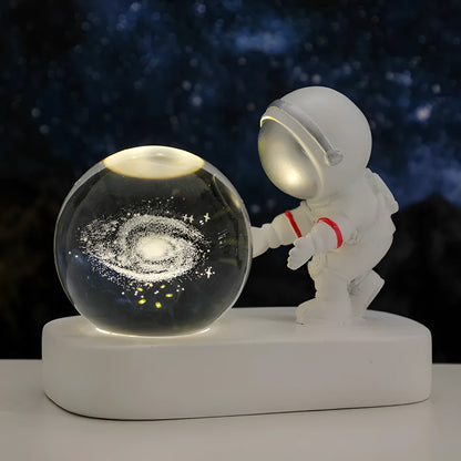 Astronaut crystal ball night light projecting galaxy pattern on 6cm resin sphere with USB cable