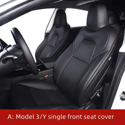 Black PVC seat cover installed on a Tesla Model 3 front seat, showing binding-style edges.