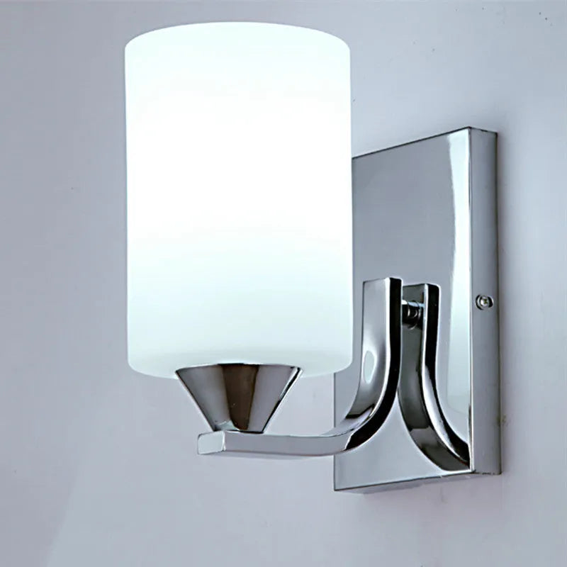 Minimalist chrome glass wall lamp with adjustable light colours for bedside illumination