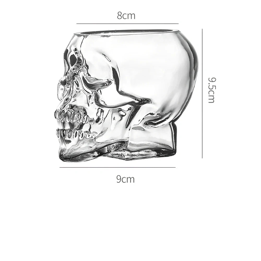 Transparent skull-shaped wine glass with detailed features and 160ml capacity measurement