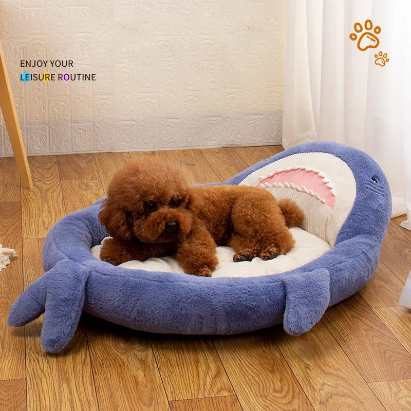 Blue shark pattern pet bed for dogs with soft velvet fabric and anti-slip base.