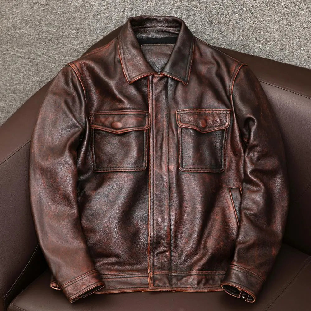 A middle-aged man wearing a brown, loose-fit PU leather jacket with a short lapel and side seam pockets.