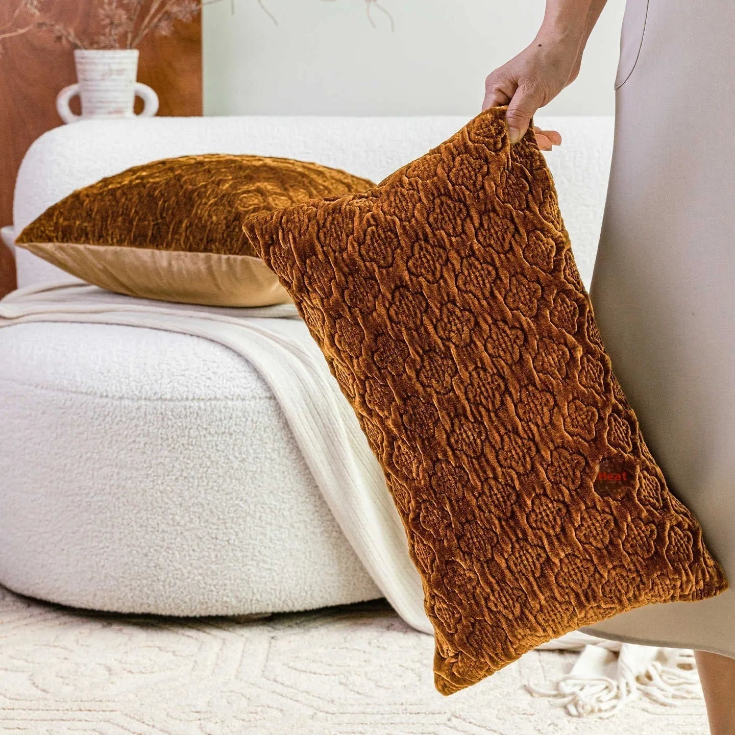 Brown gold antique style quilted cushion pillow showing three-dimensional quilting pattern and feather velvet filler