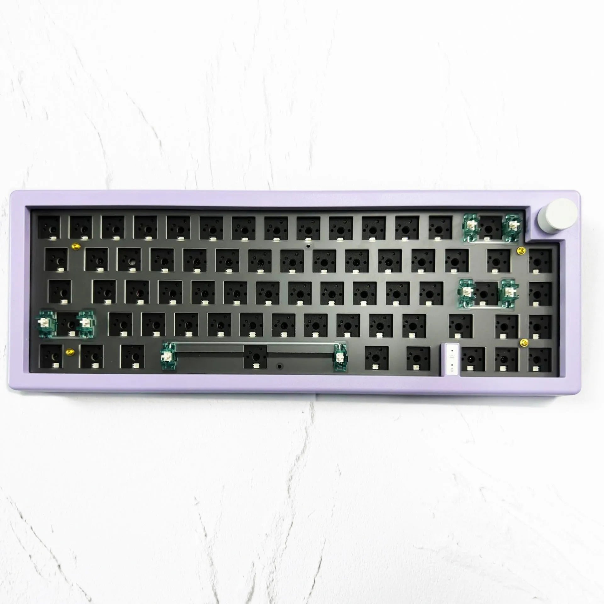 Customisable DIY mechanical keyboard kit with RGB backlighting and control knob, shown in multiple colour options