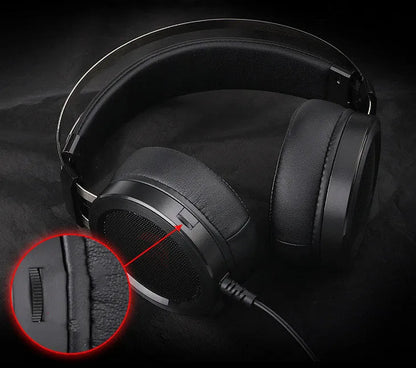 Black wired PC gaming headset with over-ear cups and a 3.5mm audio jack.