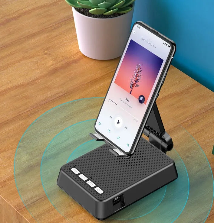 Black mobile phone broadcasting stand with Bluetooth speaker and HD microphone on desk