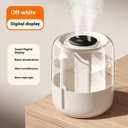 Beige round humidifier with dual spray nozzles, humidity display, and USB power connection