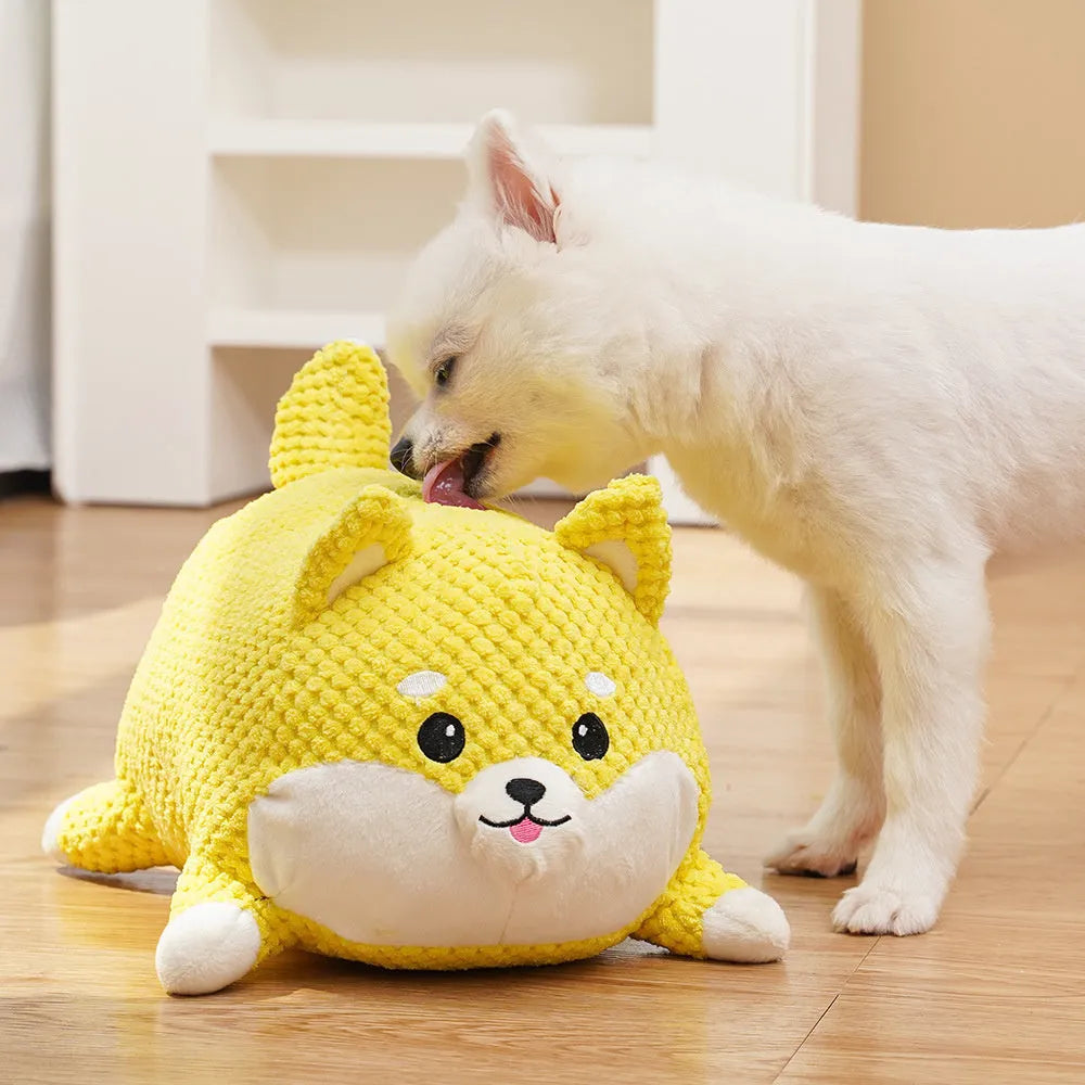 Calming plush dog toy with teeth cleaning chew surface and squeaker