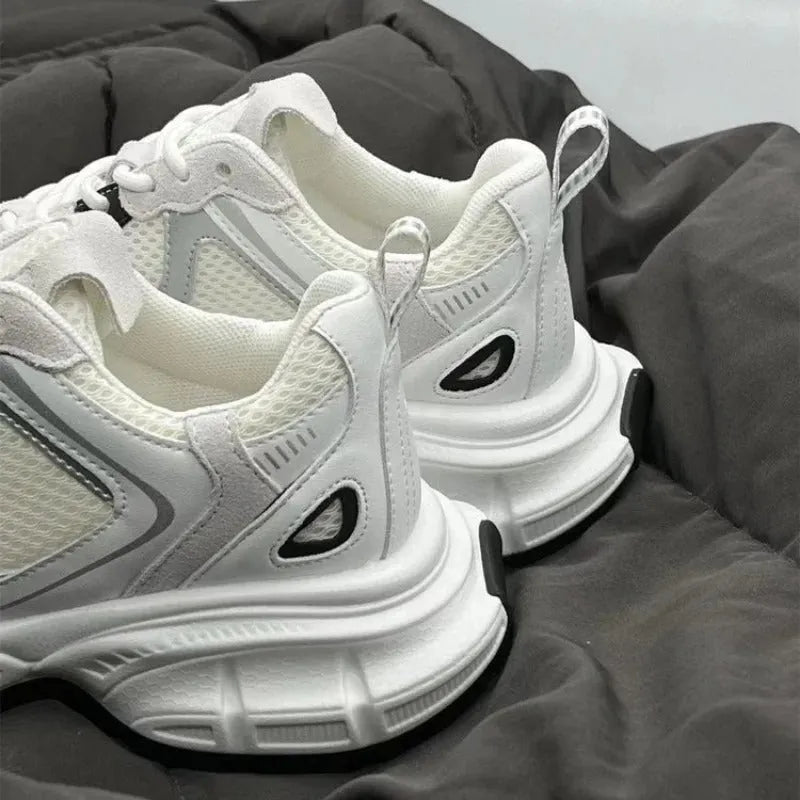 Beige Polar Wave mesh platform trainers with a wedge heel and lace-up front.