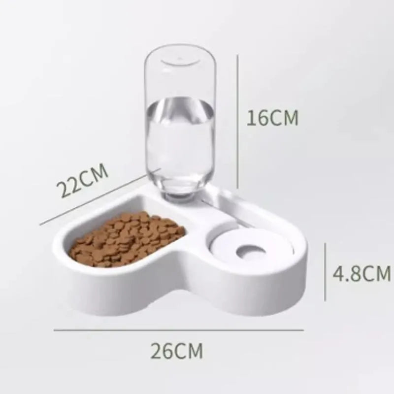 White plastic pet water fountain with pump for cats and dogs on a floor.