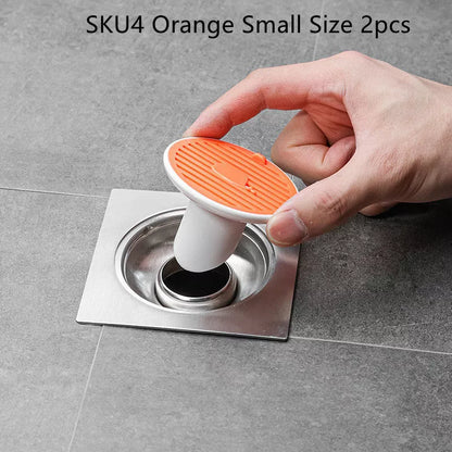 Whale Magnetic Suction Floor Drain Cover in white, orange, or green, blocking sewer odors with a tight seal