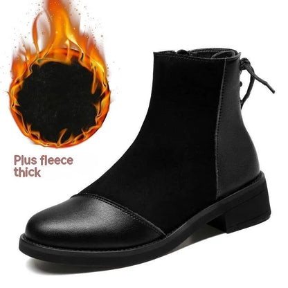 Women's black knee-length Martin boots with side zipper, non-slip rubber sole, and bow detail on microfiber upper