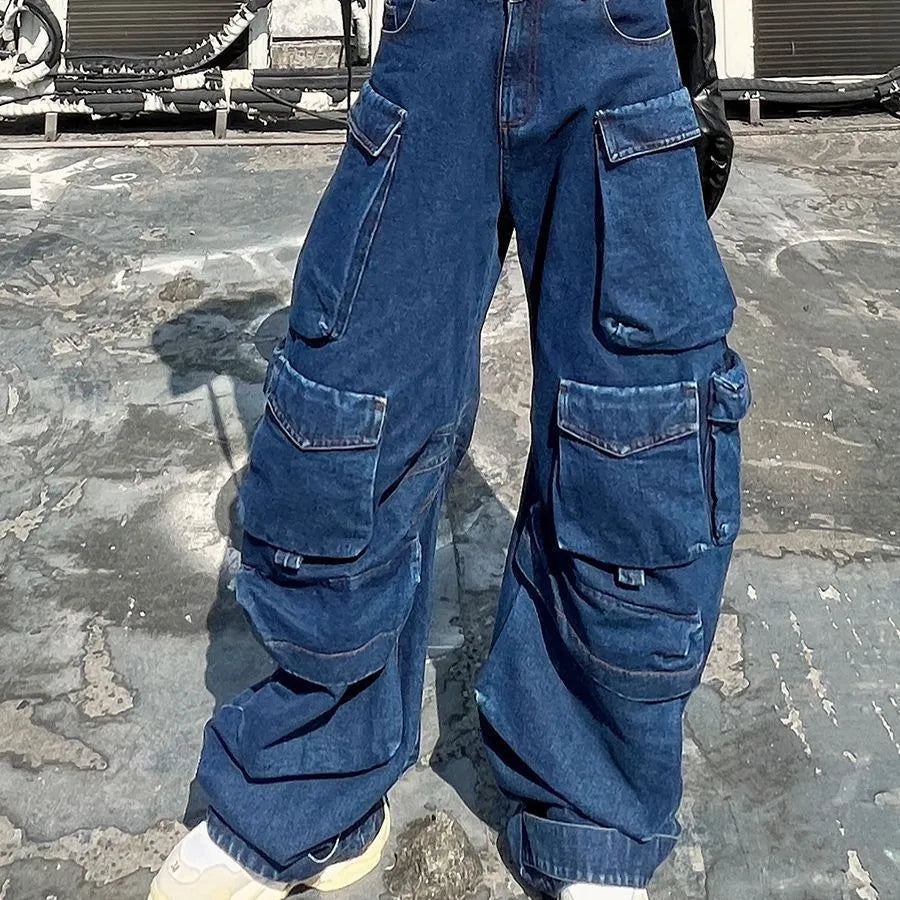 Dark blue distressed wide-leg jeans with high waist and multiple pockets on cotton denim fabric