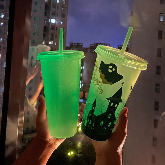 720ml plastic sippy cup with luminous straw showing cylindrical shape and Halloween colours