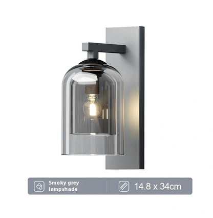 Nordic wall lamp with glass shade in amber colour, E27 holder, and compact 15 mm dimensions for wall mounting.