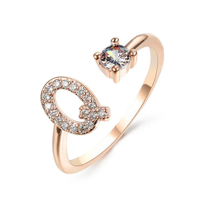 Personalized Initial Letter Adjustable Ring made of copper alloy and zircon, showcasing a vintage-inspired design