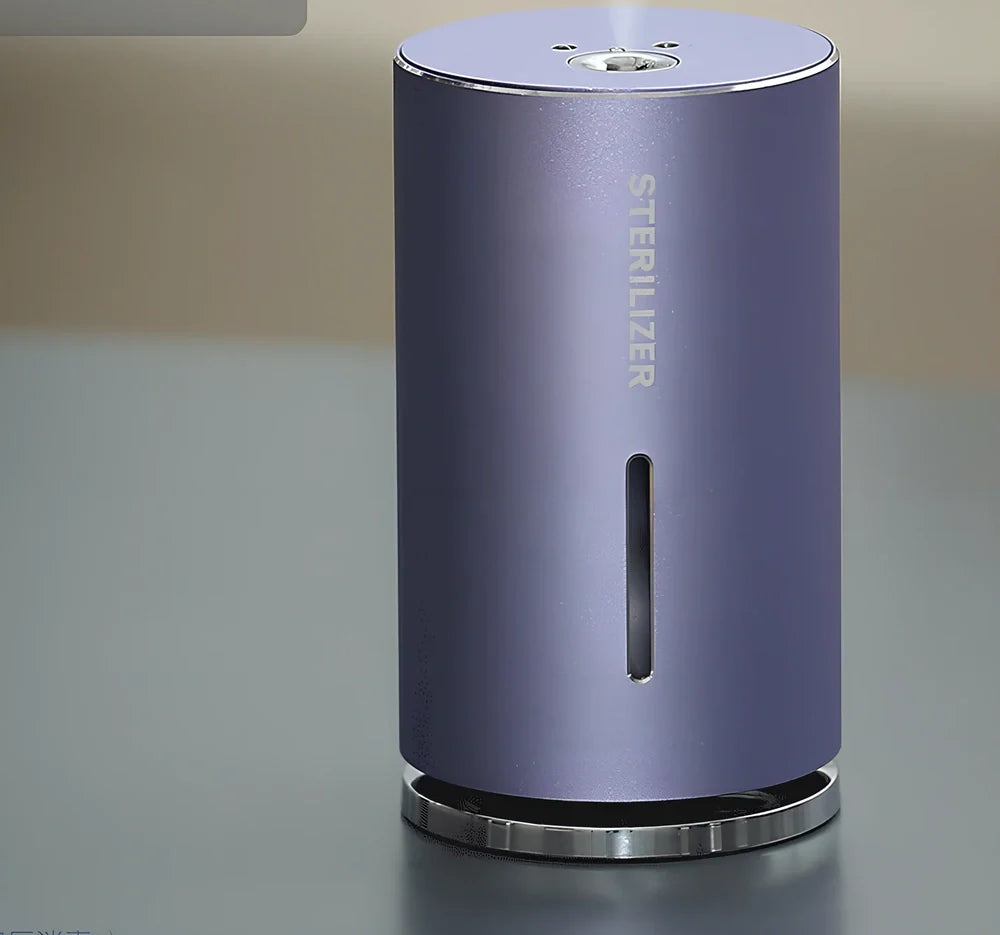 Compact aluminium humidifier with UV light, 65x65x115mm, black/green/purple colours, water tank visible