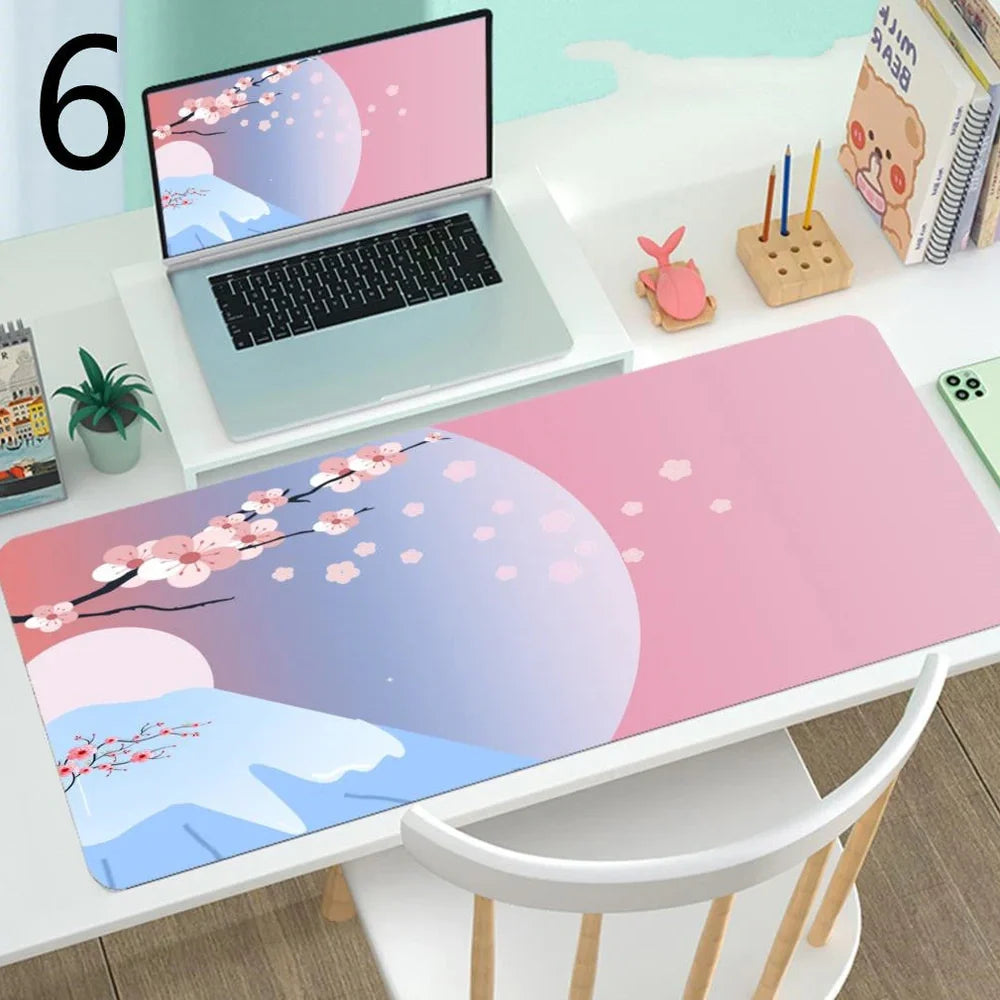 Large gaming mouse desk mat showing printed design on rubber surface with size options up to 400x900mm