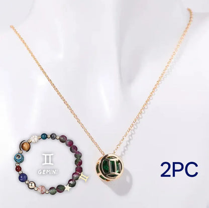 Natural stone beaded necklace and bracelet set laid out flat, showing the coordinated design and textured beads.