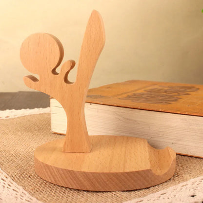 Beech wood mobile phone holder with coin slot showing adjustable angle and resin decorative elements