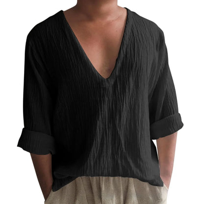 Men's washed cotton long sleeve V-neck t-shirt in a solid colour on a hanger.