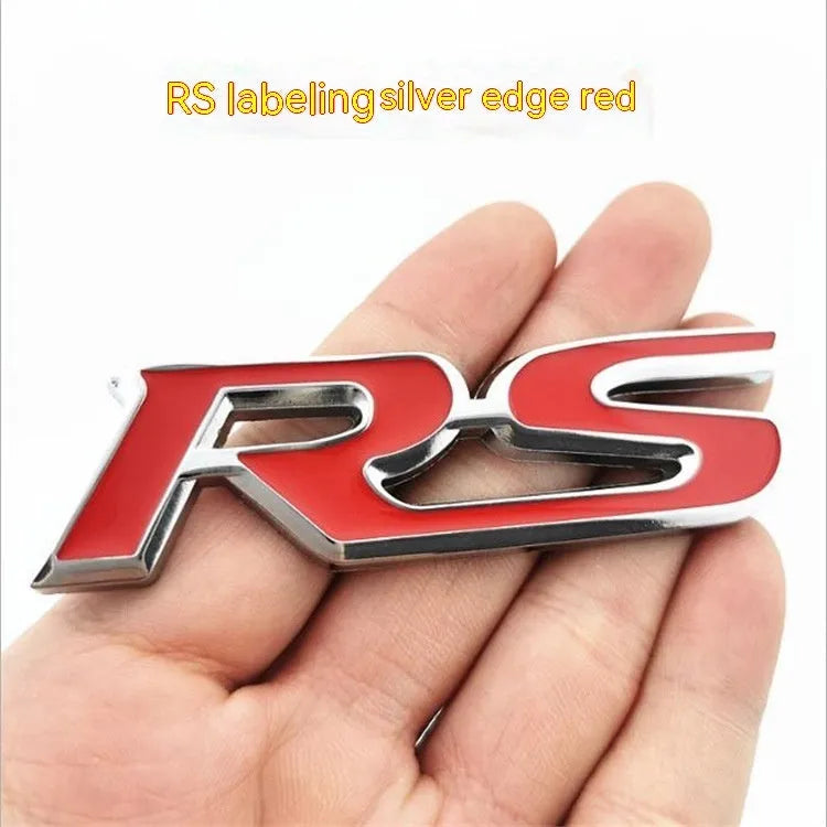 Zinc alloy metal car sticker with RS design measuring 9 by 2.4 centimetres