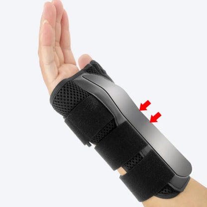 Carbon fibre sports wrist guard with thumb strap in black and grey colour scheme