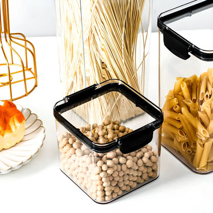 Eight transparent airtight plastic food containers in four different sizes with red sealing lids