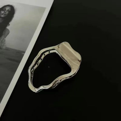 Women's gold and silver zinc alloy hair barrettes in arc, square, and triangle shapes.