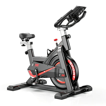 Black upright spinning bike with infinite resistance display for silent home fitness tracking distance and calories