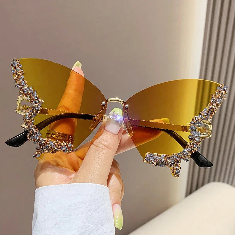 Luxurious diamond-studded butterfly sunglasses with oversized frames and a variety of color options