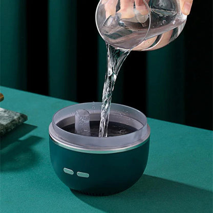 Ultrasonic aromatherapy humidifier with color-changing LED lights, compact and sleek design for home or office use