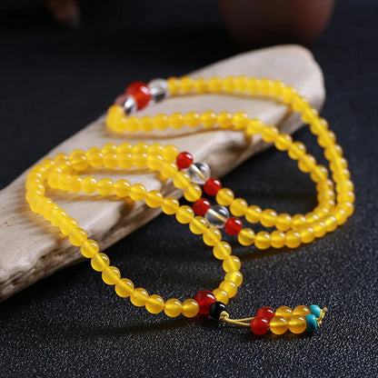 Women's crystal necklace with 108 geometric beads and lucky cat charms