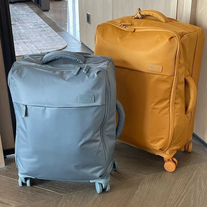Ultra-light waterproof Oxford cloth suitcase in bluestone green with universal wheels and breathable lining