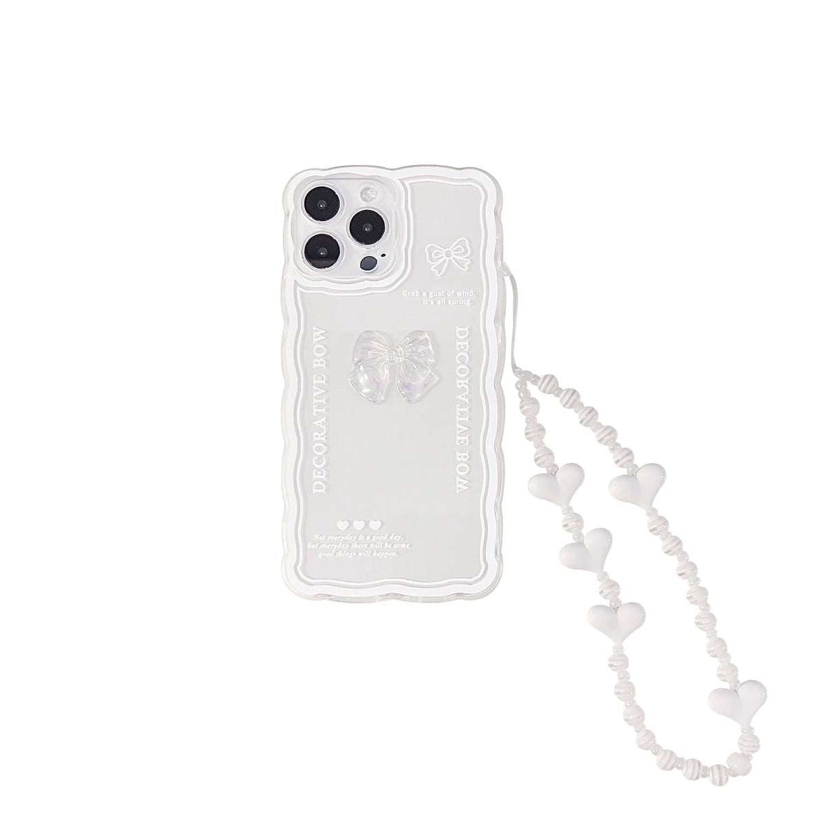 Transparent TPU iPhone case with 3D ice-through bow design on a mobile phone, showing optional white love lanyard attached.