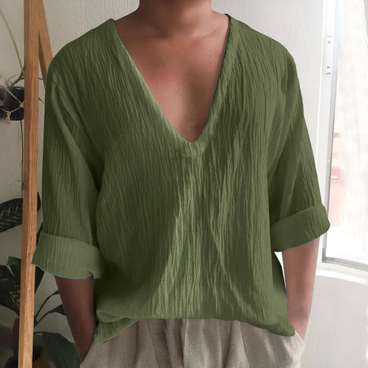 Men's washed cotton long sleeve V-neck t-shirt in a solid colour on a hanger.