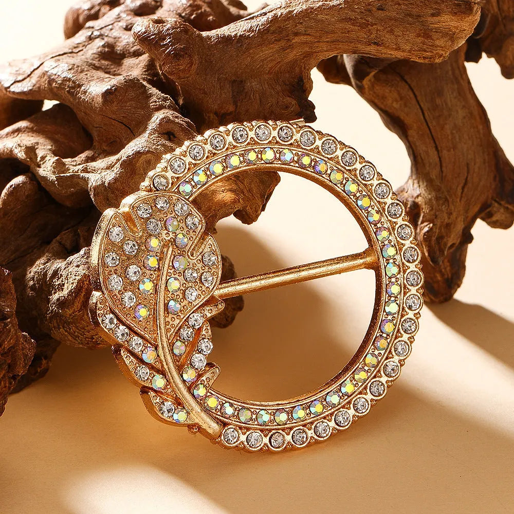 Bow-shaped waist-cinching accessory clip for high-end brooches, alloy with electroplating and diamond inlay, shown in gold, silver, or rose gold finishes.
