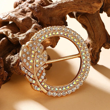 Bow-shaped waist-cinching accessory clip for high-end brooches, alloy with electroplating and diamond inlay, shown in gold, silver, or rose gold finishes.