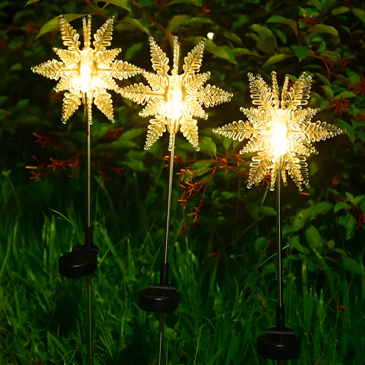 LED solar snowflake garden light with flower-shaped head, warm light, and 2V 100mA solar panel for outdoor lawn use
