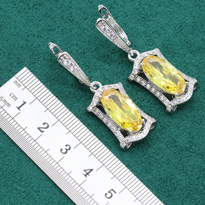 Women's yellow and olive alloy zircon jewellery set with necklace, earrings, ring, and bracelet on a snake bone chain.