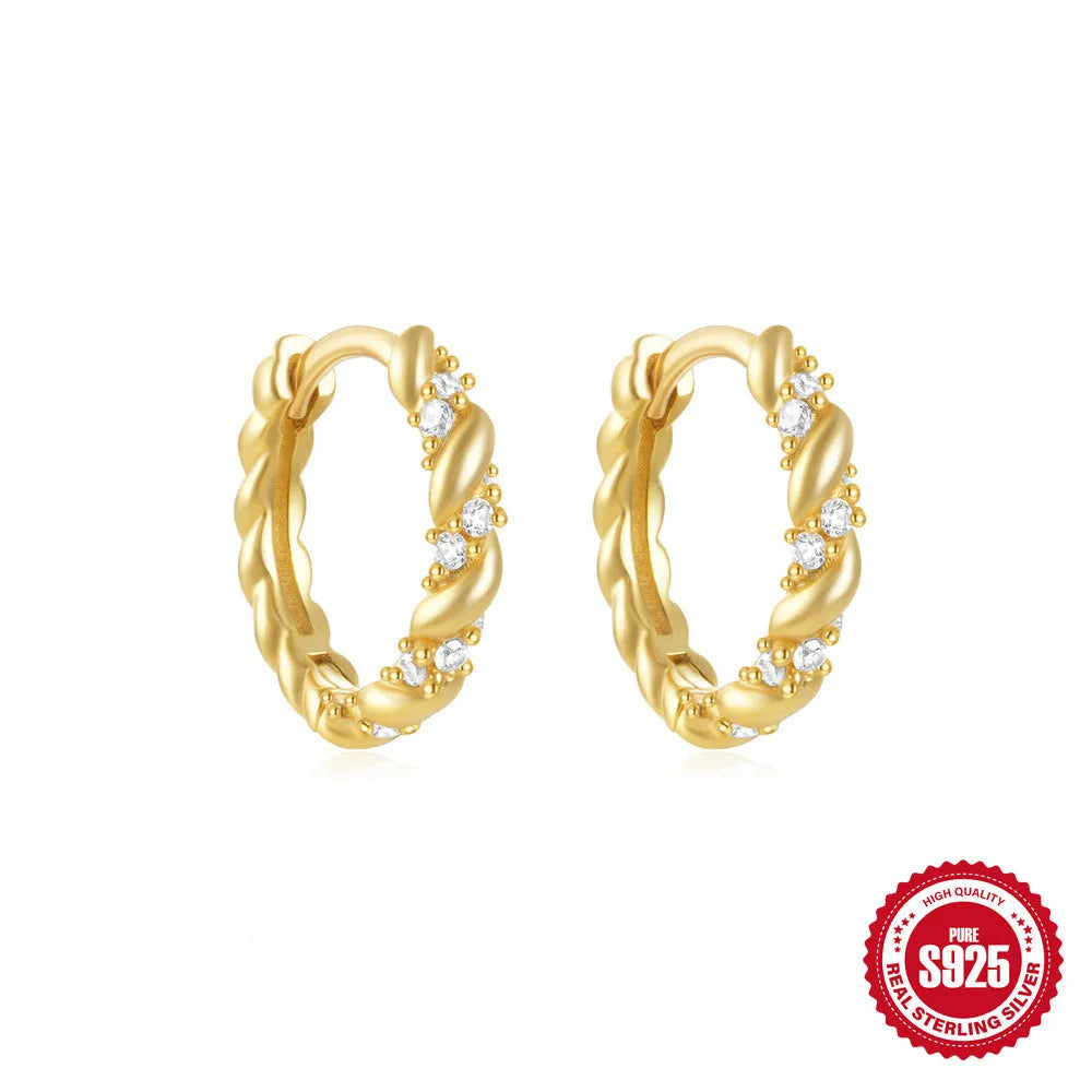 Sterling silver geometric stud earrings with small round diamond accents in gold or silver finish