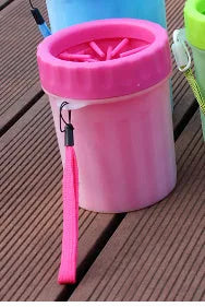 Blue silicone and PP portable dog foot wash barrel for cleaning pet paws.
