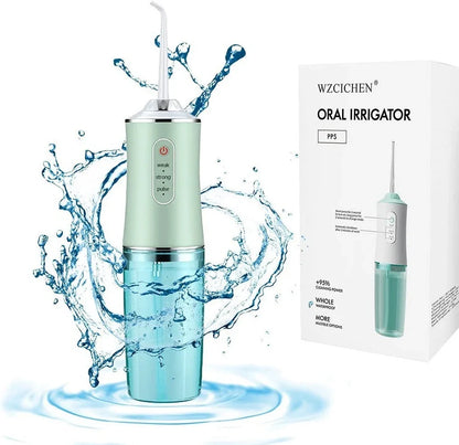 White oral irrigator with 4 nozzles showing water stream and USB charging port